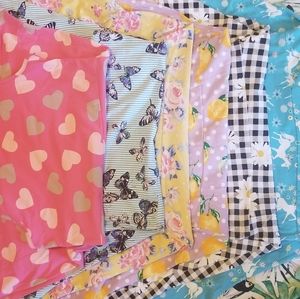 7 Girls dresses diffrent patterns same size all to